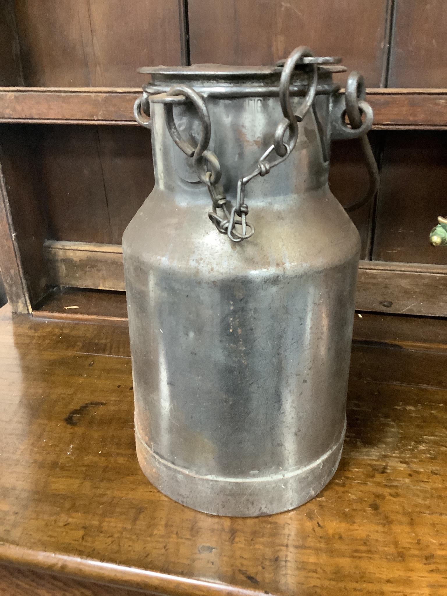 A Victorian copper coal scuttle, milk pail and two others